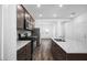 Stylish kitchen featuring granite countertops, stainless steel appliances, wood flooring, and recessed lighting at 24629 W St Catherine Ave, Buckeye, AZ 85326