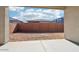 An empty backyard framed by the patio with a fence provides a blank slate for outdoor living at 22717 E Lords Way, Queen Creek, AZ 85142