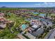 Community view showcasing golf course, pool, and clubhouse at 9612 E Champagne Dr, Sun Lakes, AZ 85248