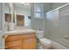 Small bathroom with tub, shower, and vanity at 9612 E Champagne Dr, Sun Lakes, AZ 85248