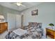 Bedroom with wood furniture and ceiling fan at 9612 E Champagne Dr, Sun Lakes, AZ 85248