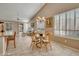 Bright dining area with wood table and chairs at 9612 E Champagne Dr, Sun Lakes, AZ 85248