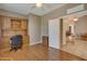 Bright home office features built-in wood shelving and desk at 9612 E Champagne Dr, Sun Lakes, AZ 85248