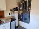 Utility area with water heater and HVAC system at 9612 E Champagne Dr, Sun Lakes, AZ 85248