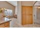 Large pantry with ample shelving at 9612 E Champagne Dr, Sun Lakes, AZ 85248