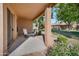 Spacious tiled patio featuring a table and chairs at 9612 E Champagne Dr, Sun Lakes, AZ 85248