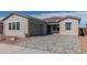 Charming single-story home boasts a paver driveway, tile roof, and stucco exterior at 11946 W Parkway Ln, Avondale, AZ 85323