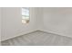 Bright bedroom with a window allowing natural light to illuminate the room at 11949 W Parkway Ln, Avondale, AZ 85323