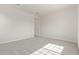 Spacious bedroom featuring neutral carpeting and a recessed ceiling light at 11949 W Parkway Ln, Avondale, AZ 85323