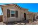 This is an exterior shot of the home with desert landscaping at 11949 W Parkway Ln, Avondale, AZ 85323