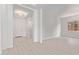 Bright and airy living space featuring modern finishes, ample natural light, and sleek flooring at 11949 W Parkway Ln, Avondale, AZ 85323