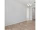 Open-concept living area with tile floor and bright lighting at 12003 W Parkway Ln, Avondale, AZ 85323
