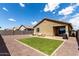Expansive backyard with gravel, artificial turf, and patio furniture, perfect for entertaining at 18147 W Ida Ln, Surprise, AZ 85387