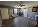 Bright bedroom with wood-look floors, and a barn door at 206 N 5Th St, Avondale, AZ 85323