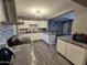 Modern kitchen with granite countertops and white cabinets at 206 N 5Th St, Avondale, AZ 85323