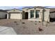 Well-maintained front yard with desert landscaping and a charming exterior at 10262 W Columbus Ave, Avondale, AZ 85392