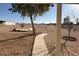 Landscaped pathway leads to a large backyard at 11927 E Reksom Rd, Florence, AZ 85132