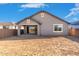 Back of the house featuring a covered patio and sliding glass doors at 5338 W Manzanita Dr, Glendale, AZ 85302