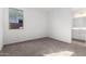 Bedroom featuring neutral carpet, paint, a window, and a bathroom counter at 5338 W Manzanita Dr, Glendale, AZ 85302