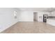 Expansive open-concept living space with tile flooring, offering versatile layout options and bright light at 5338 W Manzanita Dr, Glendale, AZ 85302