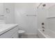 Bathroom featuring a shower-tub, a floating shelf and brushed nickel fixtures at 5344 W Manzanita Dr, Glendale, AZ 85302