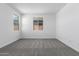Neutral bedroom with cozy carpet, white walls and windows allowing for natural light at 5344 W Manzanita Dr, Glendale, AZ 85302