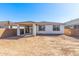 A serene backyard with a covered patio, perfect for relaxing and entertaining outdoors at 5332 W Manzanita Dr, Glendale, AZ 85302