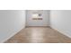 A room with tile flooring and a single window at 5332 W Manzanita Dr, Glendale, AZ 85302