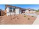 This home features desert landscaping and is part of a well-manicured community at 5332 W Manzanita Dr, Glendale, AZ 85302