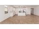 Open-concept kitchen features white cabinets, stainless steel appliances, and island perfect for entertaining at 5332 W Manzanita Dr, Glendale, AZ 85302