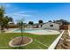 Beautiful backyard with a sparkling pool and artificial turf at 934 E 8Th St, Mesa, AZ 85203