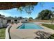 Relaxing pool area with lush landscaping and a shed at 934 E 8Th St, Mesa, AZ 85203