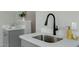 Modern bar sink with a black gooseneck faucet at 934 E 8Th St, Mesa, AZ 85203
