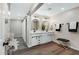 Spa-like bathroom with double vanity, and walk-in closet at 934 E 8Th St, Mesa, AZ 85203