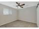 Bright bedroom with ceiling fan and neutral decor at 934 E 8Th St, Mesa, AZ 85203