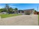 Newly renovated home with a spacious yard and a long driveway at 934 E 8Th St, Mesa, AZ 85203