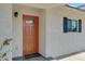 Modern front door with updated hardware and a welcoming mat at 934 E 8Th St, Mesa, AZ 85203