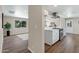 Open concept kitchen with a peninsula and stainless steel appliances at 934 E 8Th St, Mesa, AZ 85203