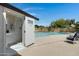 Inviting pool area with a shower and lounge chair at 934 E 8Th St, Mesa, AZ 85203