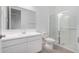 Bathroom featuring a modern vanity and a glass enclosed shower at 12322 W Marguerite Ave, Avondale, AZ 85323