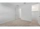 Neutral bedroom featuring carpet flooring and white walls at 12322 W Marguerite Ave, Avondale, AZ 85323