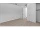 Bedroom with carpet and multiple doors at 12322 W Marguerite Ave, Avondale, AZ 85323