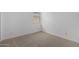 Cozy bedroom featuring carpet flooring and white walls at 12322 W Marguerite Ave, Avondale, AZ 85323