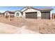 Home featuring a brick driveway and a two-car garage at 12322 W Marguerite Ave, Avondale, AZ 85323