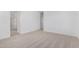 Spacious main bedroom with carpet flooring, an en-suite bathroom, and a walk-in closet at 12322 W Marguerite Ave, Avondale, AZ 85323