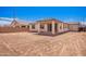 Open backyard with potential for landscaping and a patio area at 12326 W Marguerite Ave, Avondale, AZ 85323