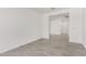 This bedroom offers tile floors and a wide entrance at 12326 W Marguerite Ave, Avondale, AZ 85323
