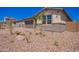 Attractive single-Gathering home showcasing a landscaped front yard with an attached garage at 12326 W Marguerite Ave, Avondale, AZ 85323