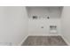 Functional laundry area boasts convenient hookups and ample space at 12326 W Marguerite Ave, Avondale, AZ 85323