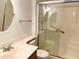 Well lit bathroom with updated fixtures, sink and shower at 10509 W Tropicana Cir, Sun City, AZ 85351